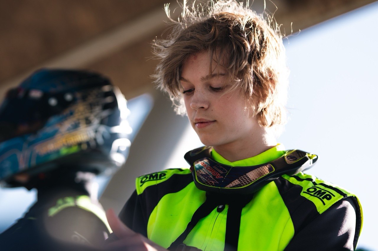 Close-up of Trofim Krotov's helmet visor during preparation.